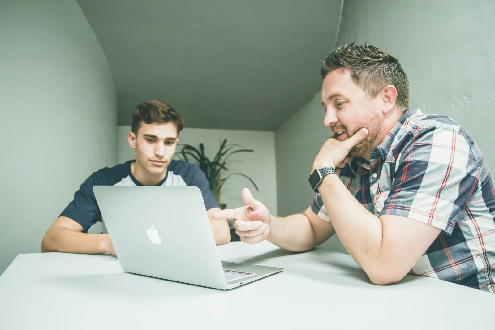 two man discussing - Product Photography Pricing
