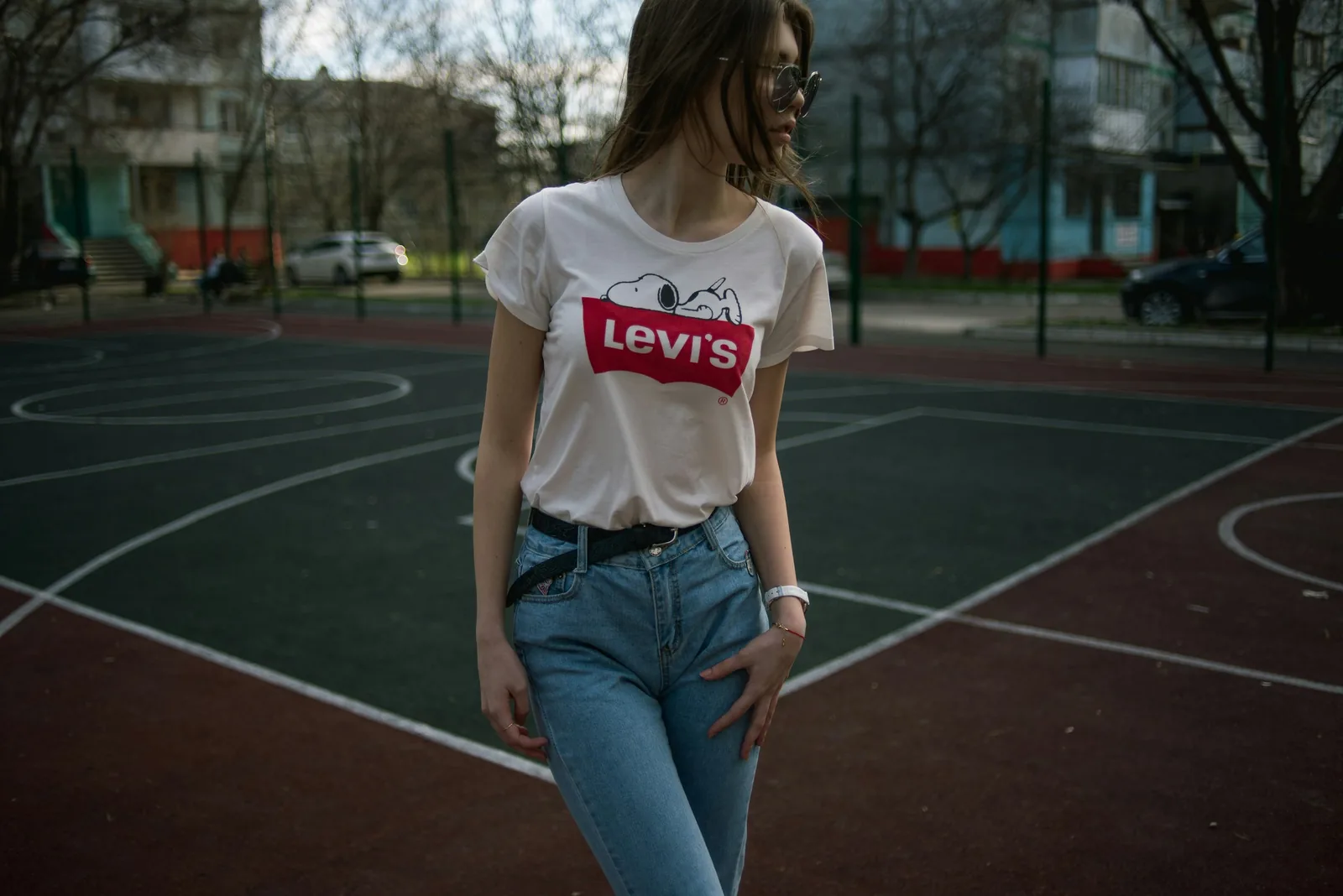 woman near a tennis court - Clothing Brand Photoshoot Ideas