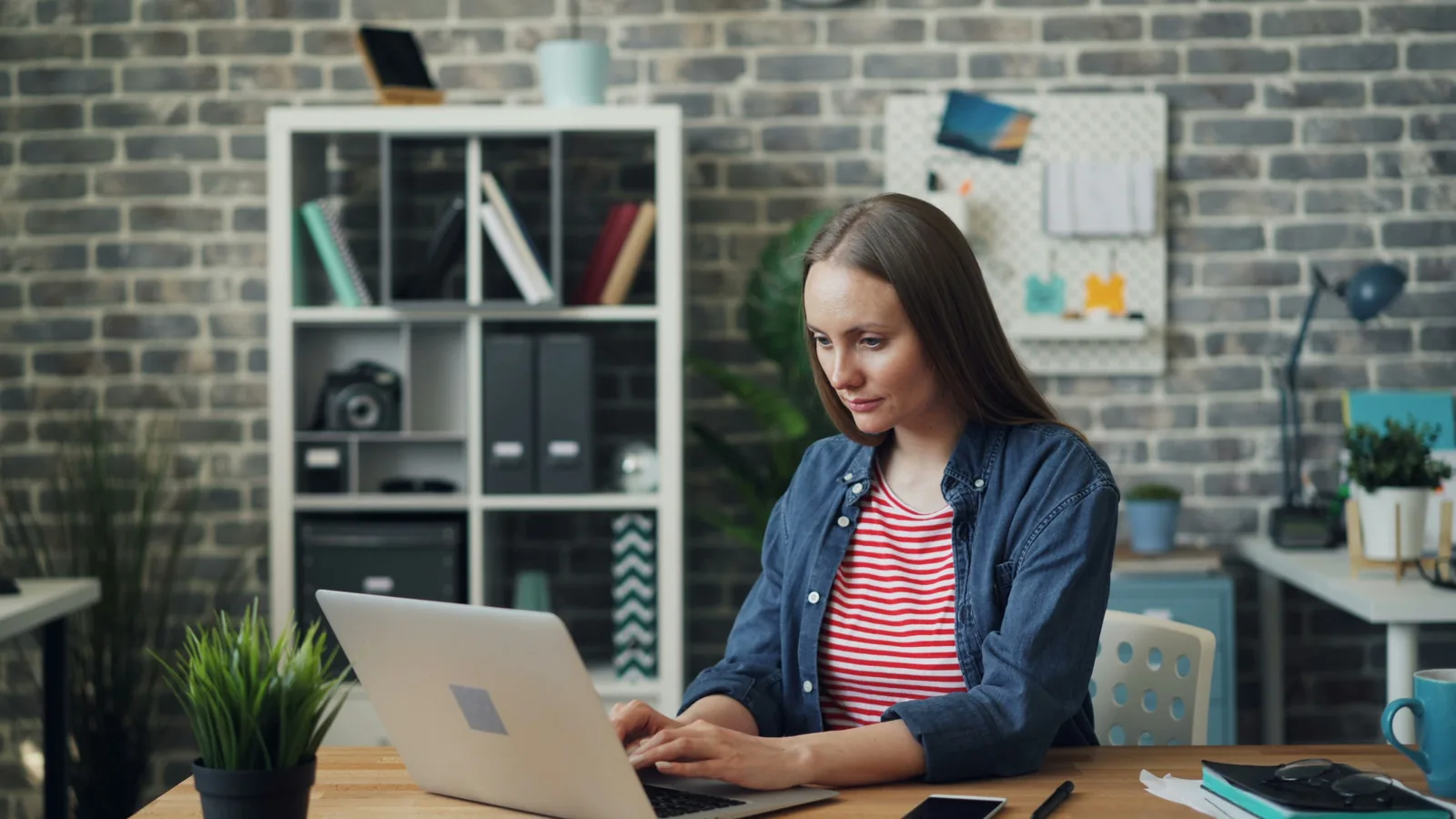 woman working - Invideo AI Competitors