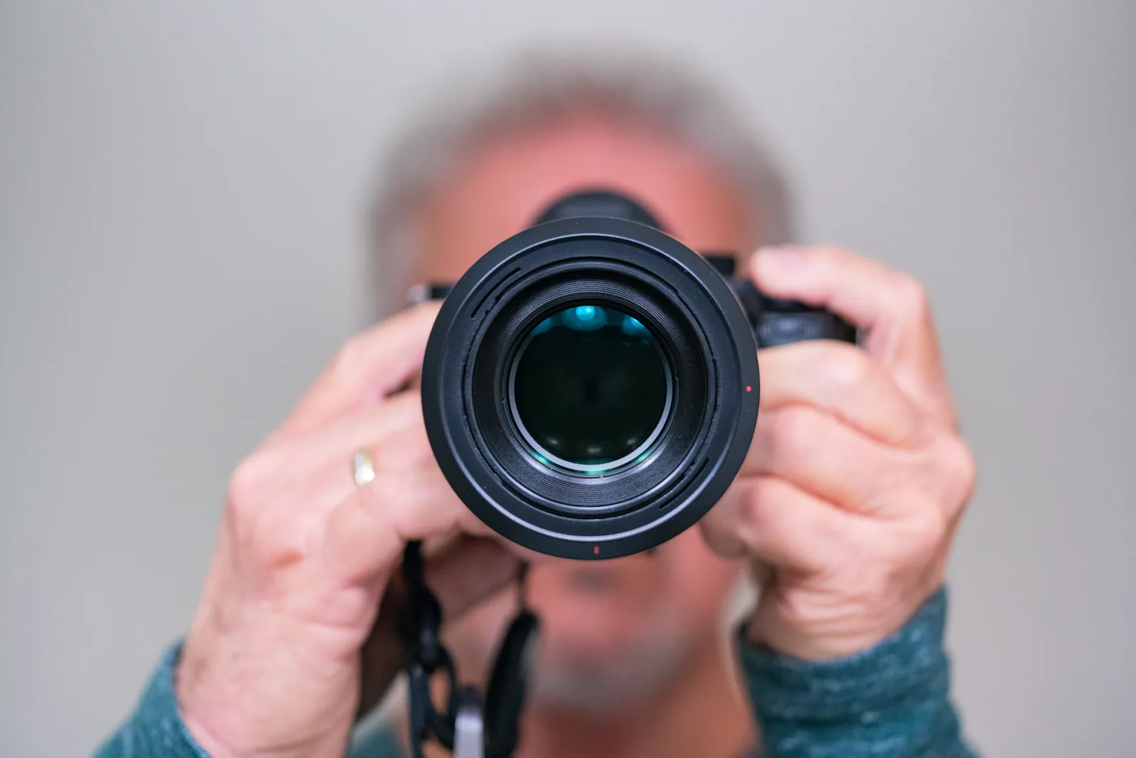 person with camera - Best Lens for Food Photography