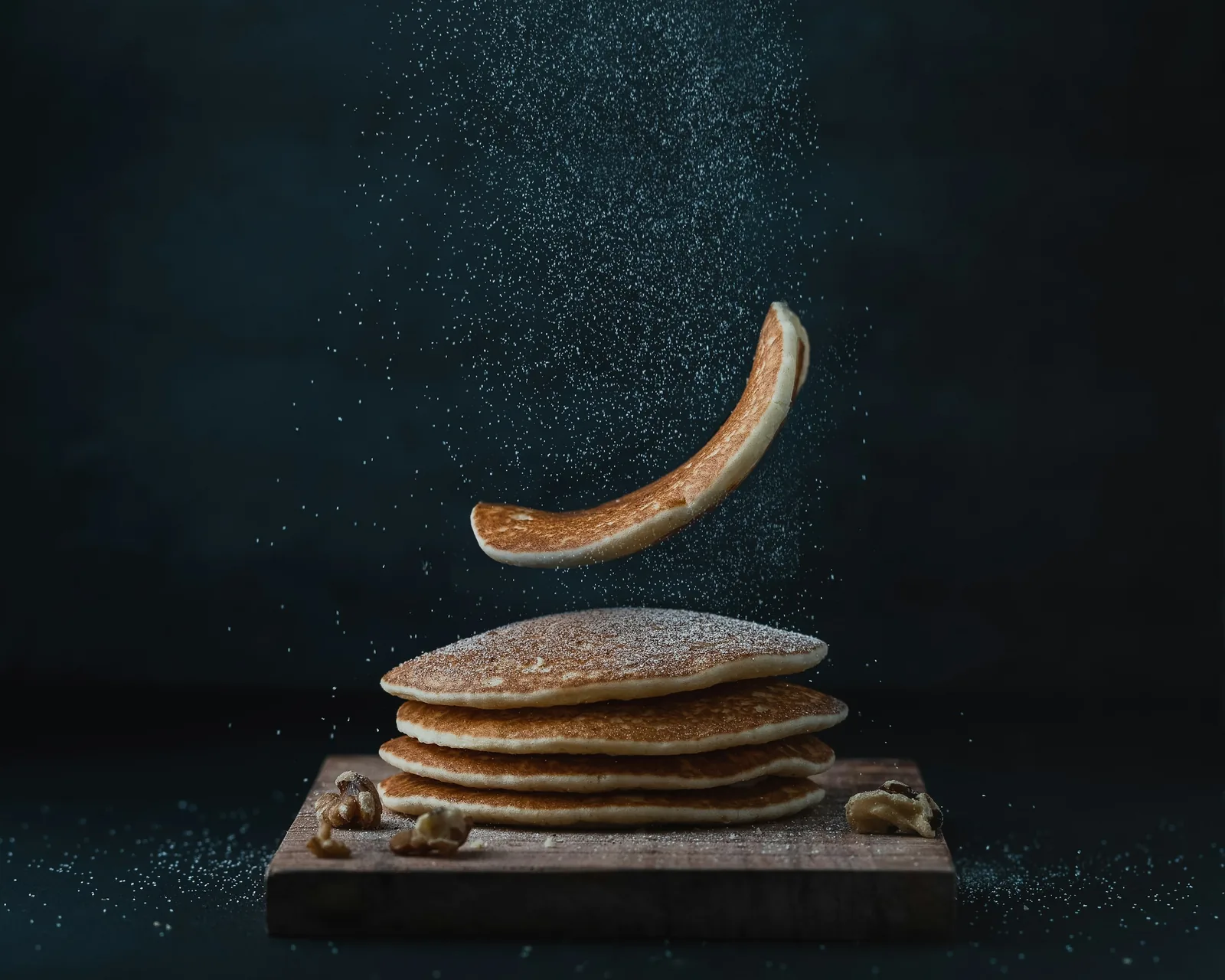 pancakes with black background - Lighting for Food Photography