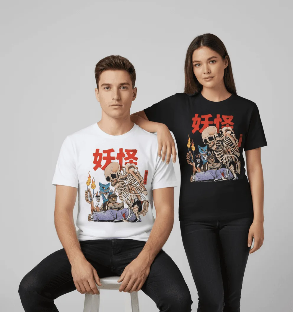 man and woman in a professional white photography studio wearing the same graphic t shirt in different colours
