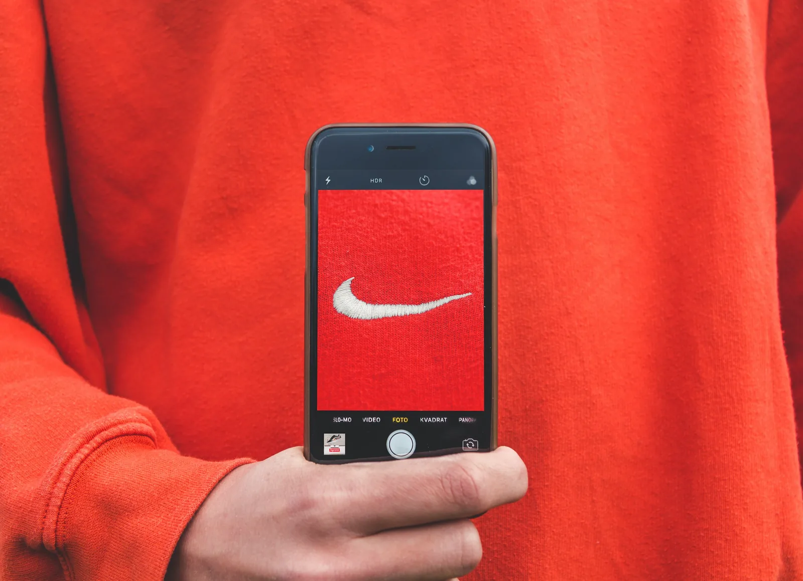 man taking a photo - Product Photography Ideas