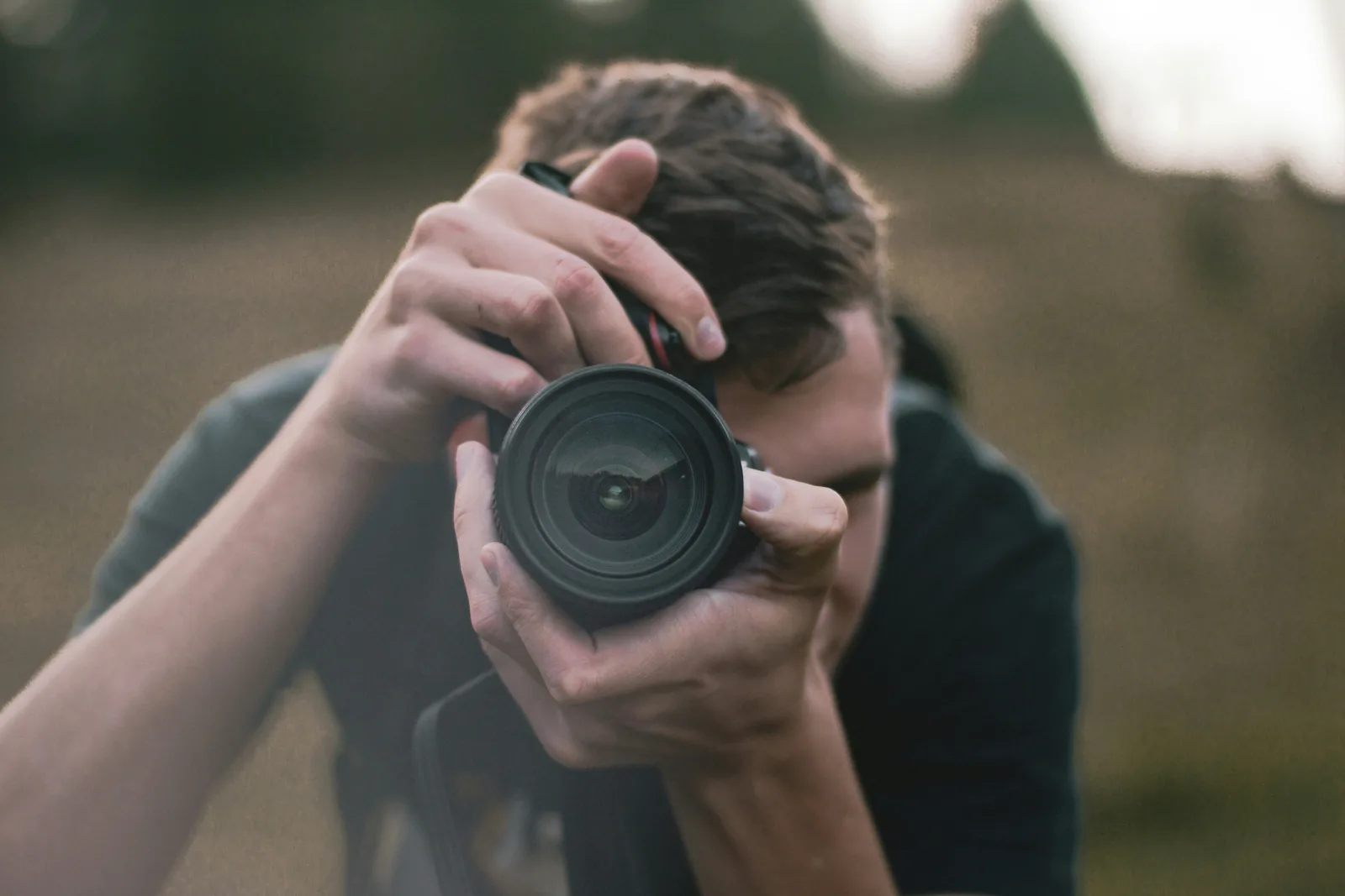 person taking picture - Platform-Specific Image Size Recommendations