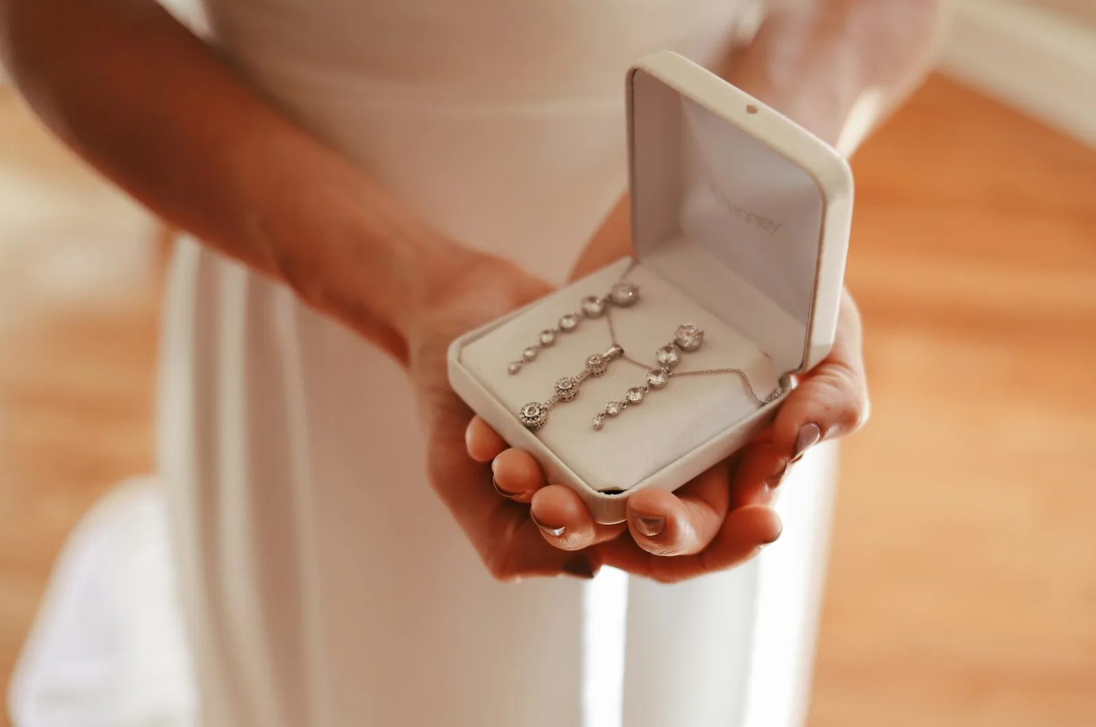 person showing jewelry box - Light Box Photography for Jewelry