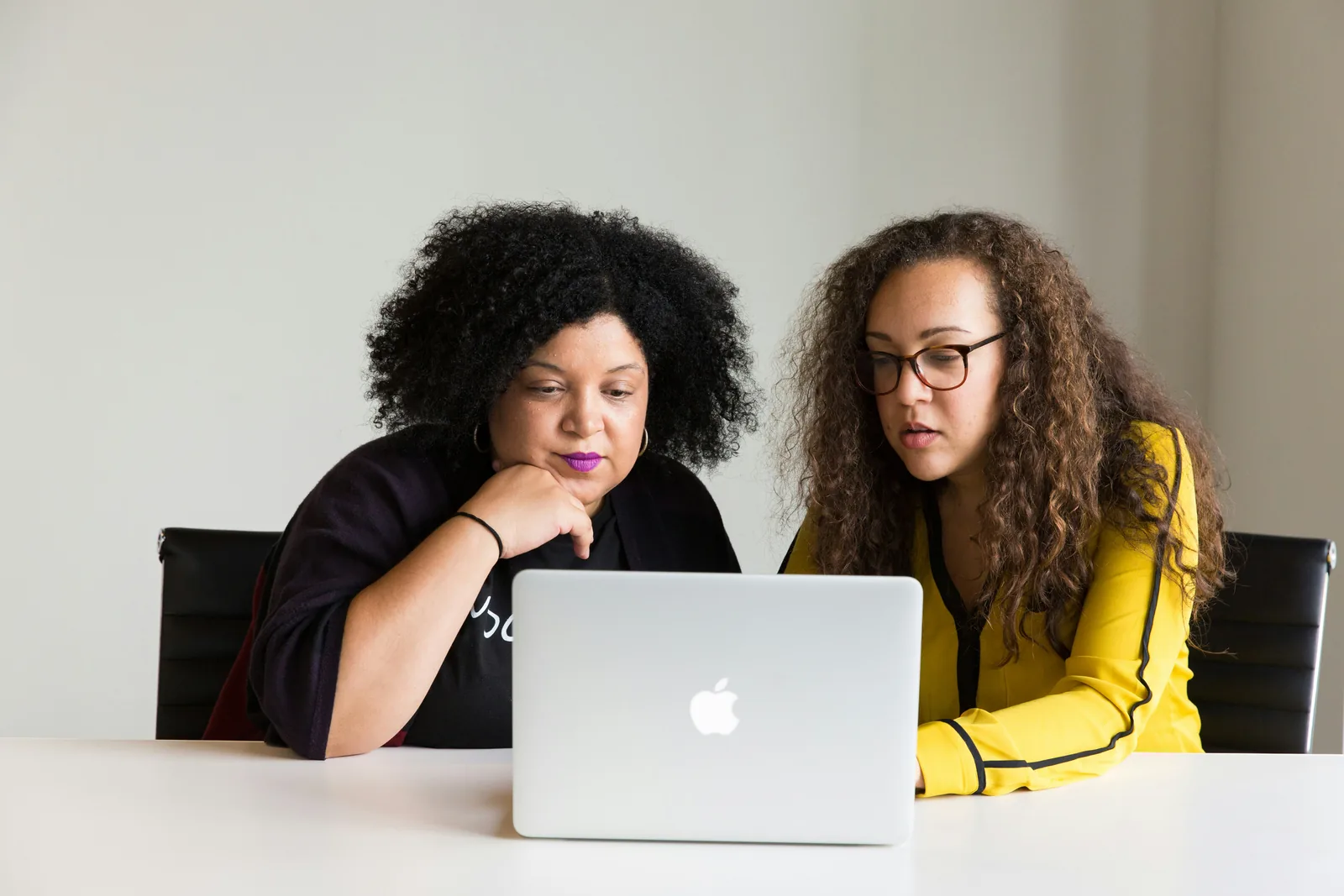 two woman working together - AI Photoshoot