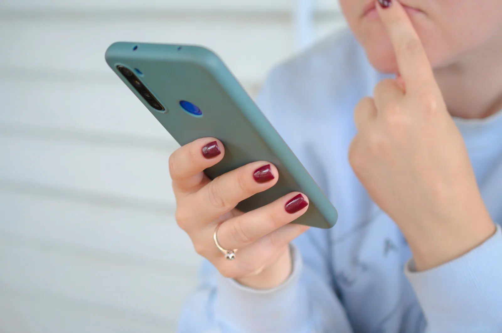 person on phone - Add to Cart Conversion Rate