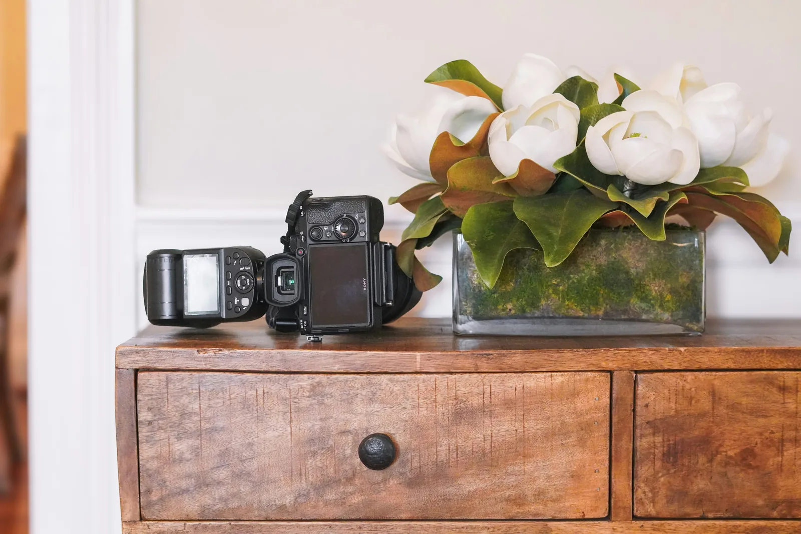 camera on a table - Product Photography At Home