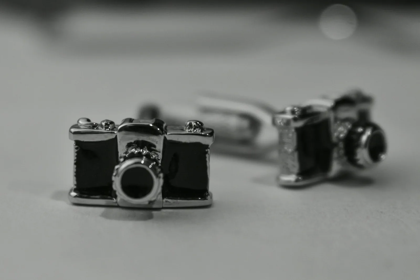 Cameras Laying - Best Lens for Jewelry Photography