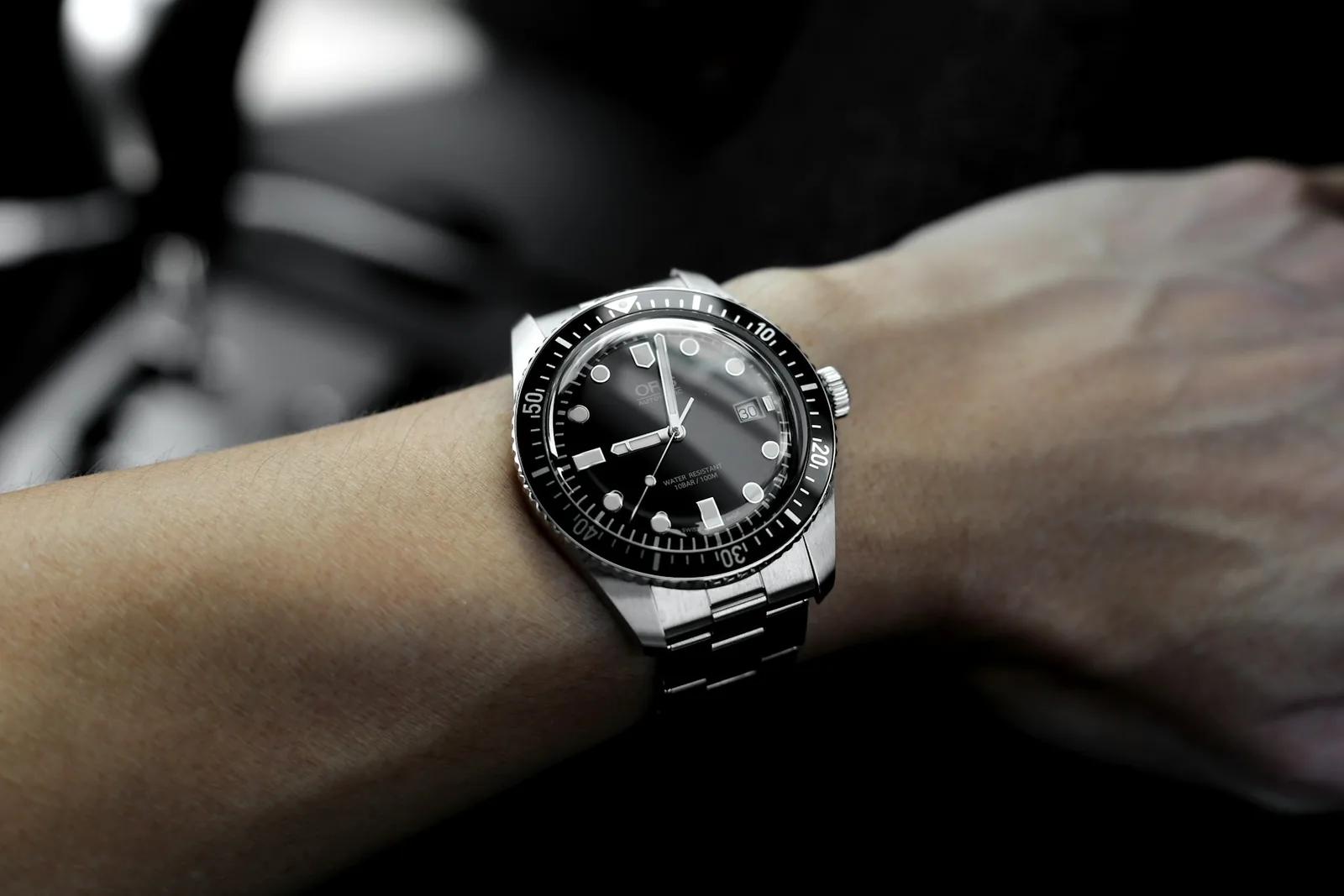 man showing off his watch - Watch Product Photography