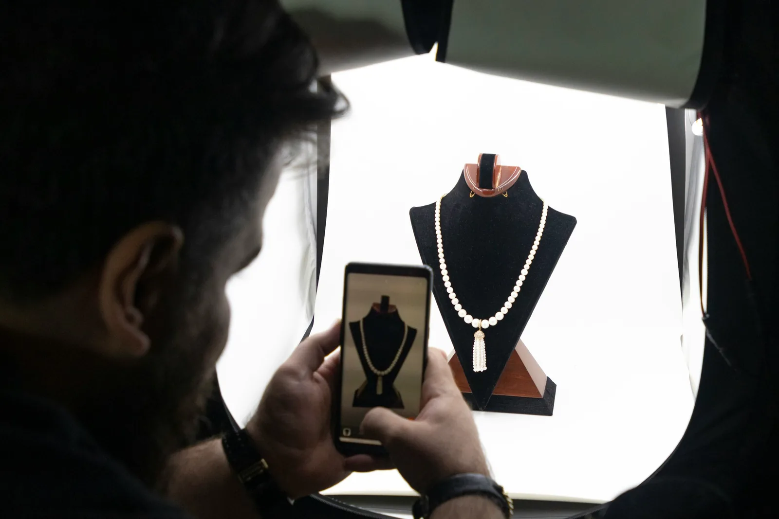 person taking a photo - Creative Jewellery Photography