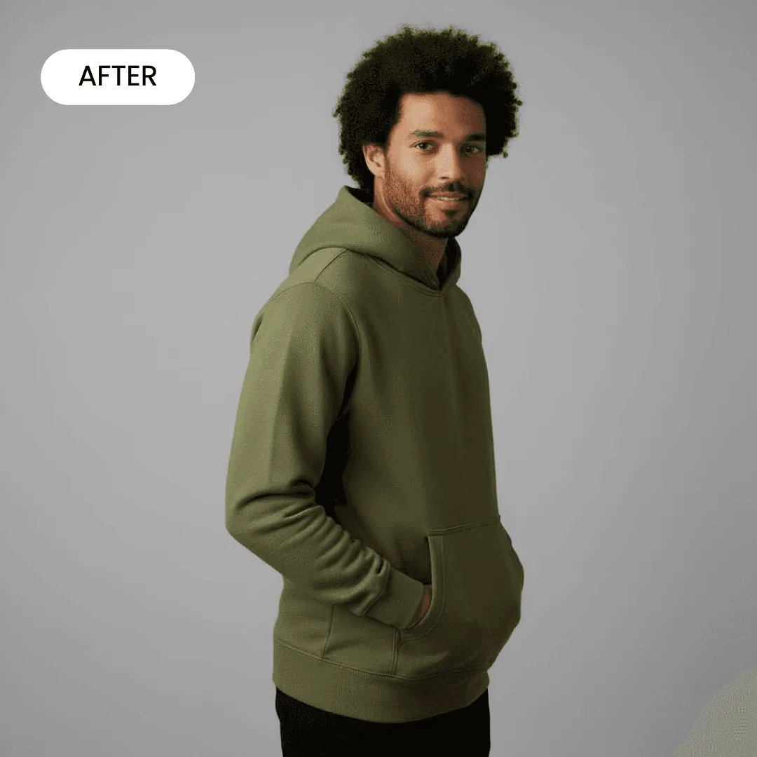 green hoodie on a mixed race man standing in a grey professional studio facing the side