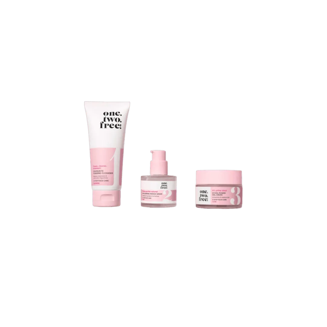 pink skincare products on white plain background
