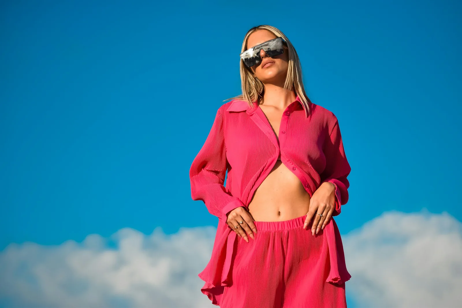 woman showing off her glasses - Sunglasses Photography 